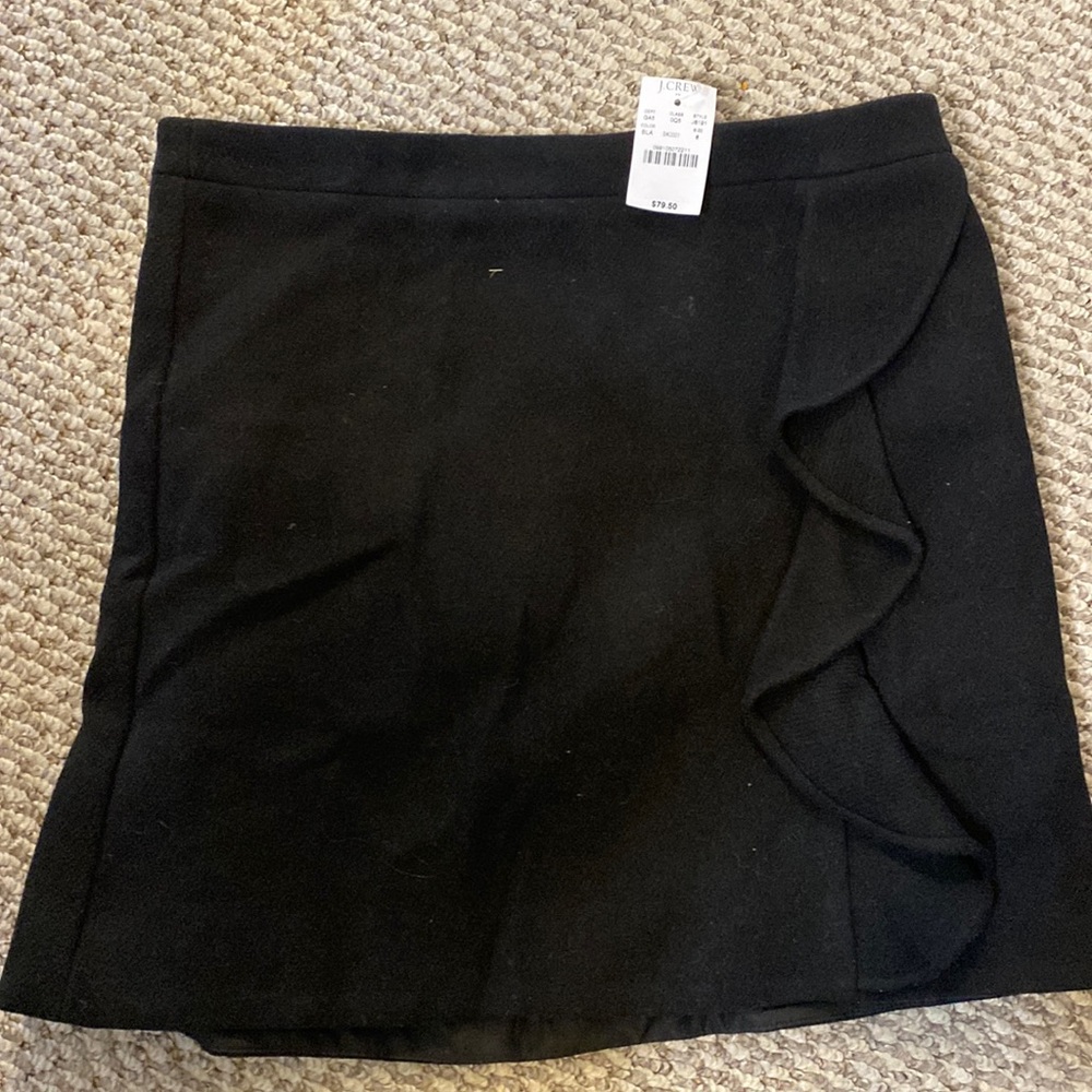 Never worn winter black skirt with ruffle detail